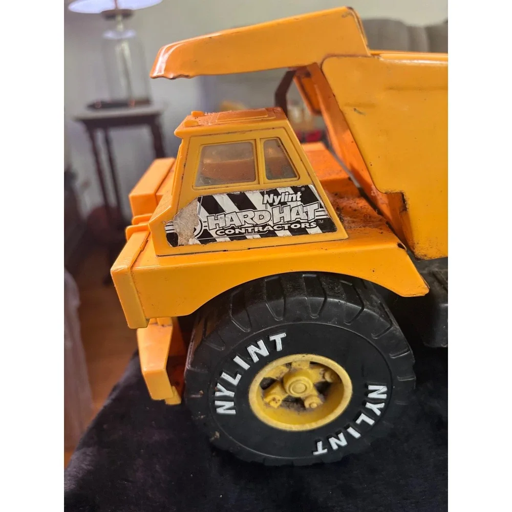 Vintage Nylint Hard Hat Contractors Yellow Pressed Steel Dump Truck Toy